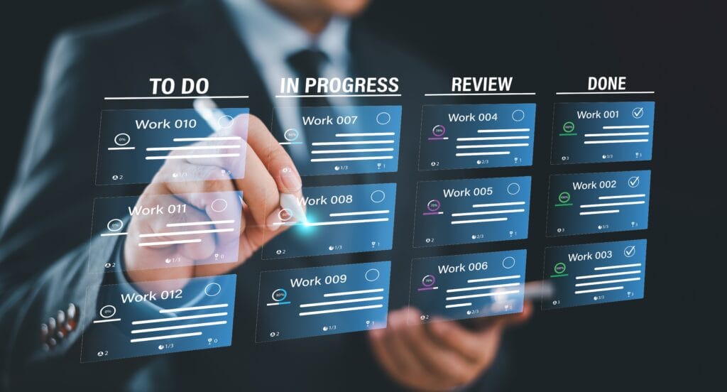 Business person interacting with floating text that illustrates the Agile framework.